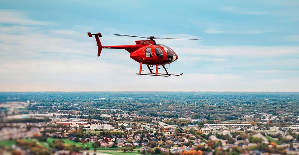 Helicopter Aerial Inspection Over Urban Area