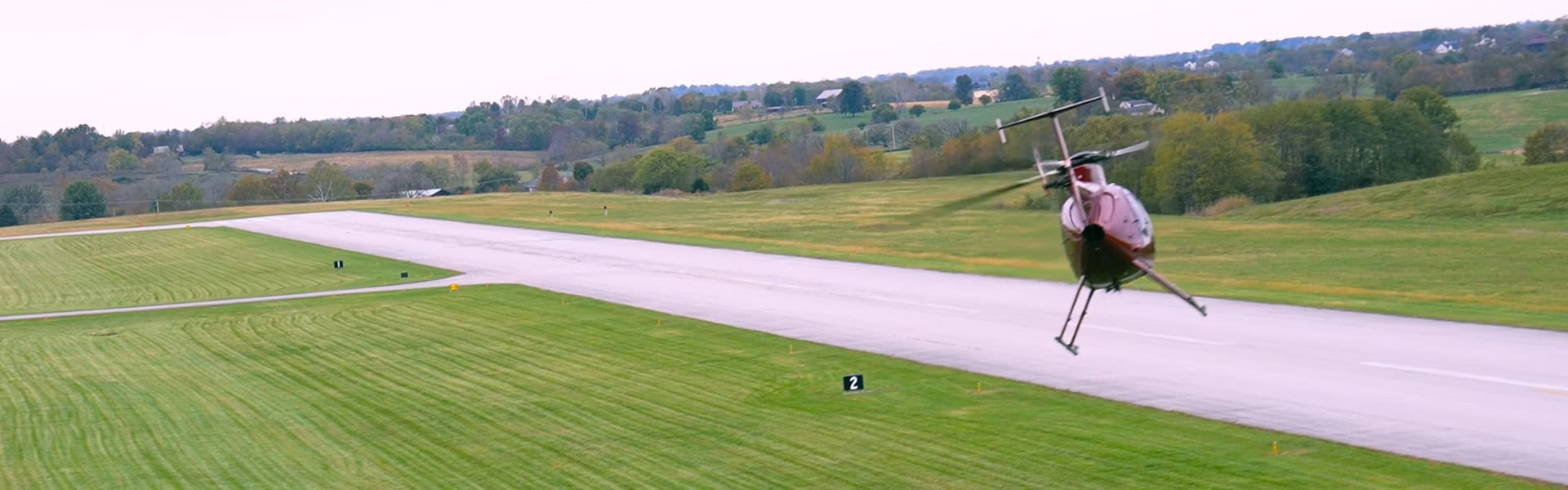 Helicopter Flight Training Over Airfield