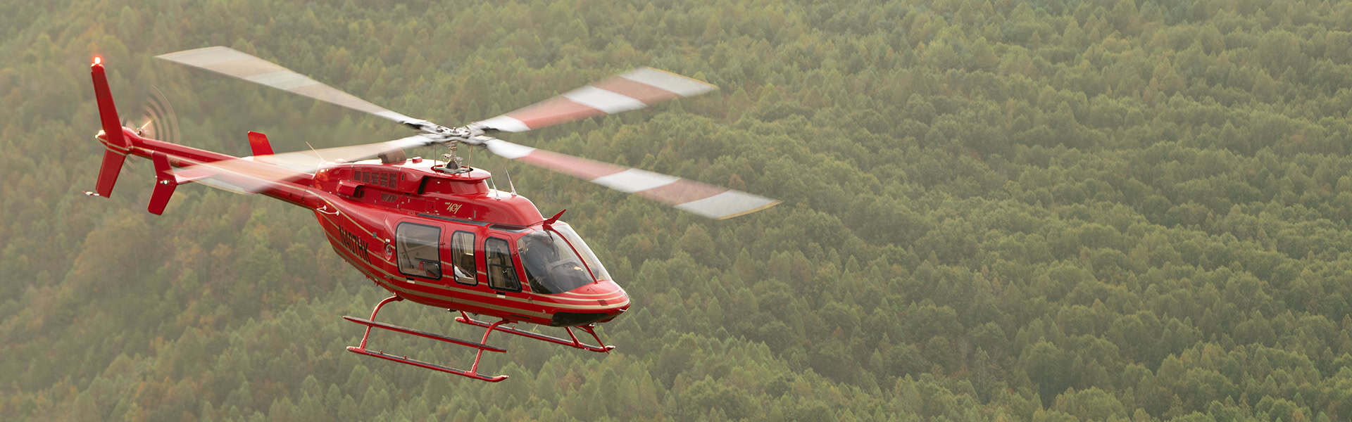 Helicopter Pilot Side View In Flight