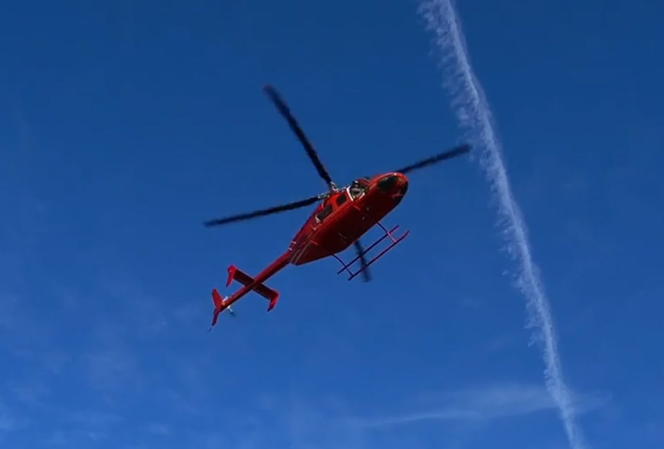 Red Helicopter In Flight Blue Sky
