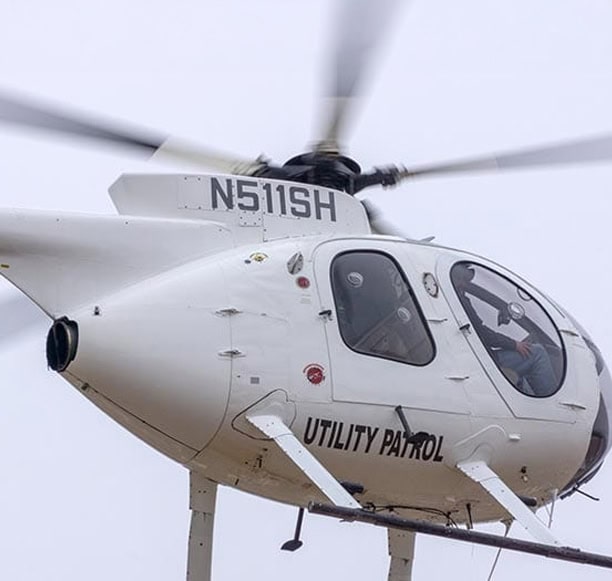 Utility Patrol Helicopter In Flight